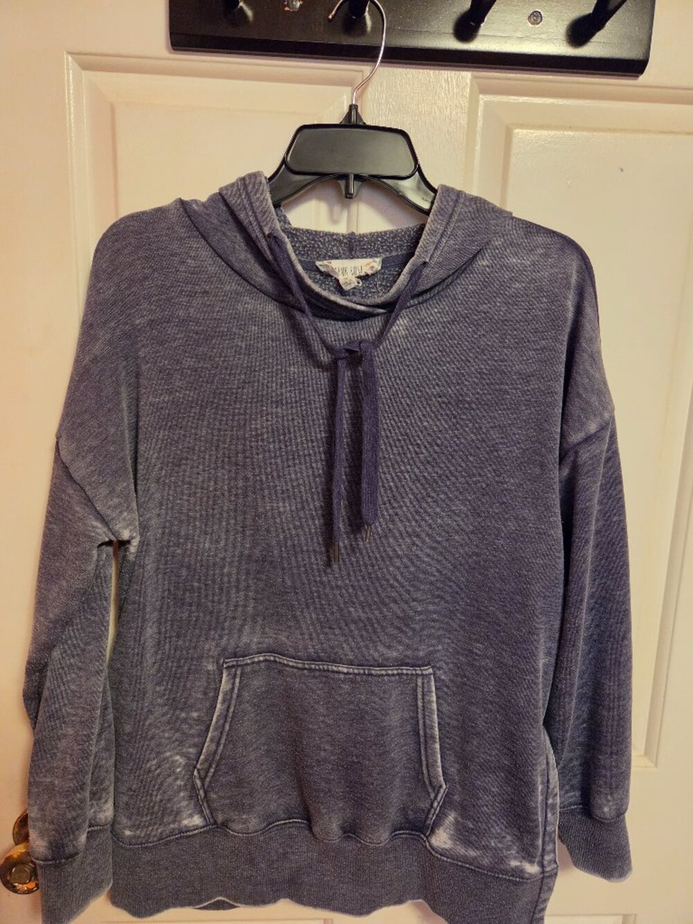 This is a Mineral washed pink Rose Rose hoodie brand.